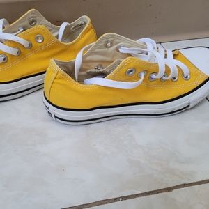 Chuck Taylor (Converse) yellow. Women size 7 low top. Used, still nice condition